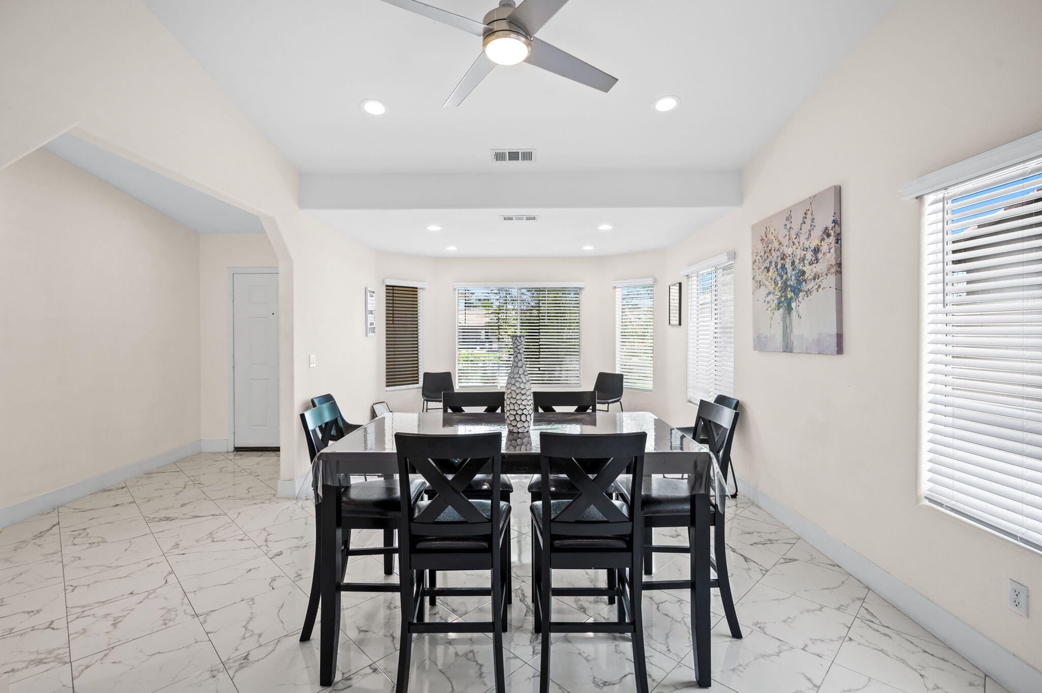 68210 Empalmo Road Cathedral City, CA 92234 - Photo 4 of 34 a view of a dining room with furniture and window