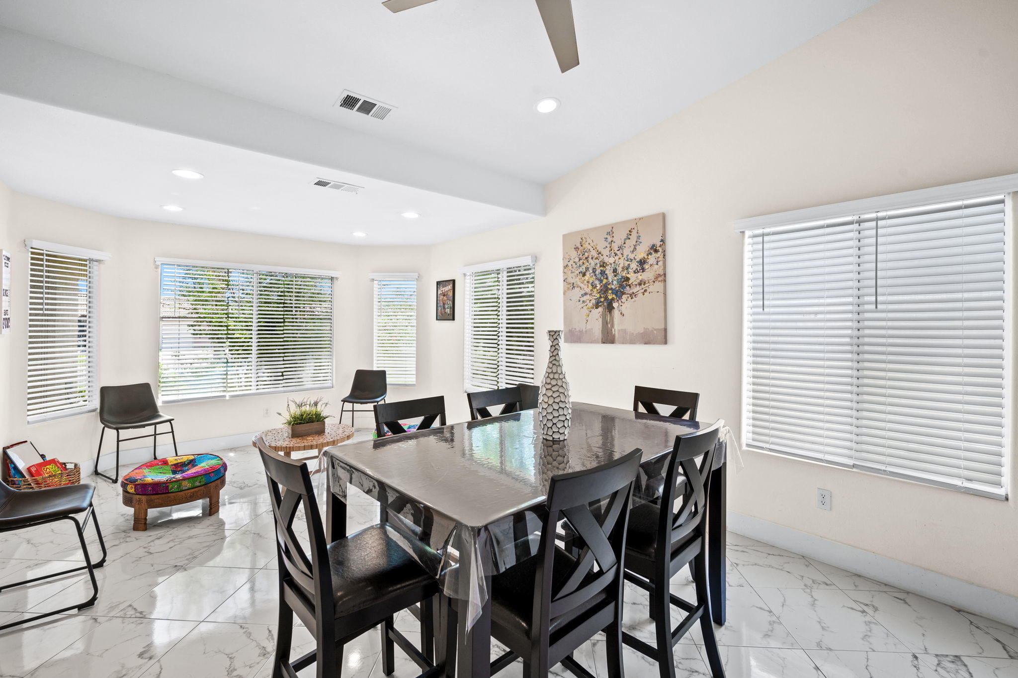 68210 Empalmo Road Cathedral City, CA 92234 - Photo 7 of 34 a view of a dining room with furniture and windows