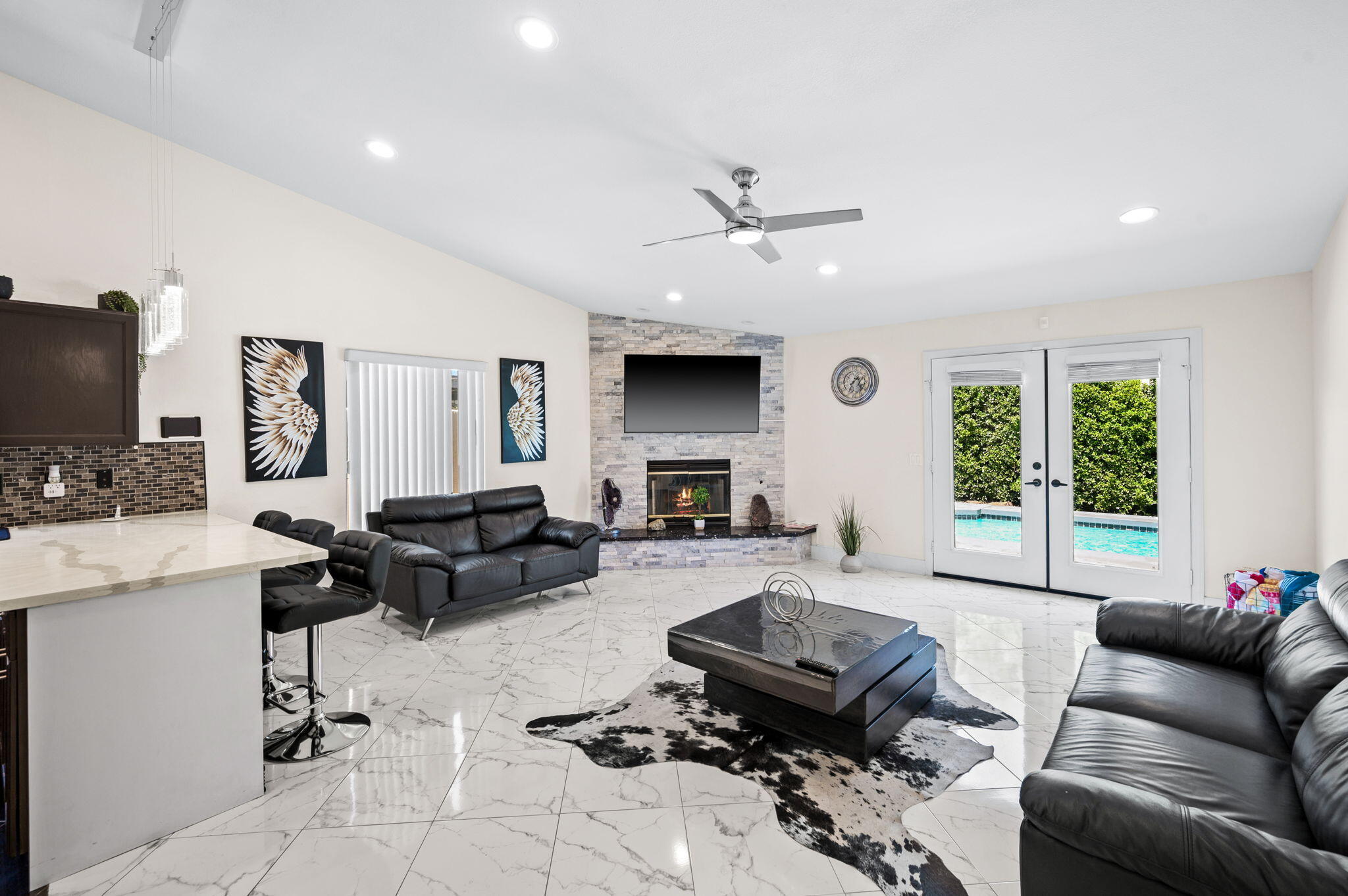 68210 Empalmo Road Cathedral City, CA 92234 - Photo 8 of 34 a living room with furniture and a flat screen tv