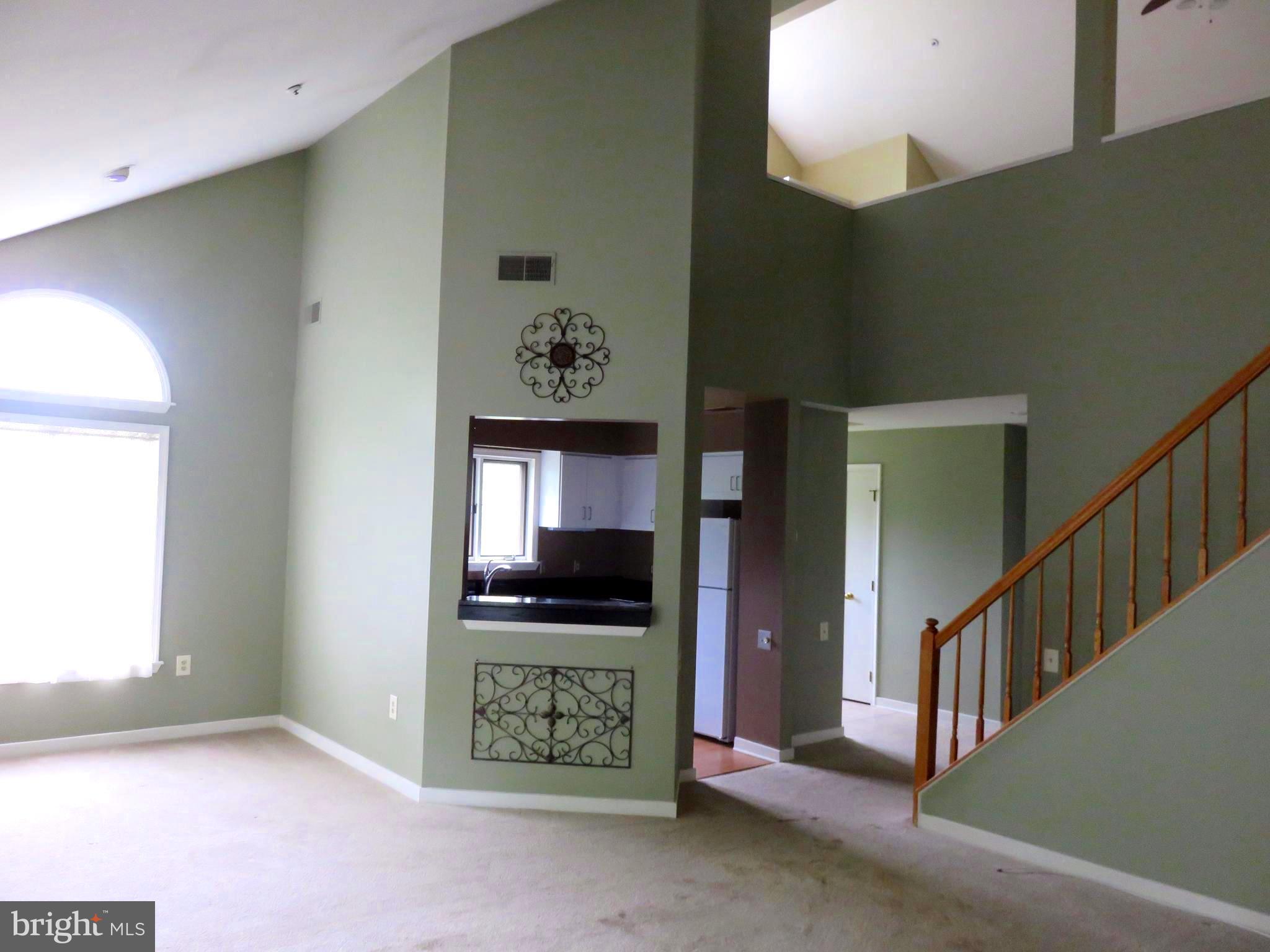 325 Pleasanton Road, Unit B24 Westminster, MD 21157 - Photo 8 of 17 Looking towards dining room and kitchen.