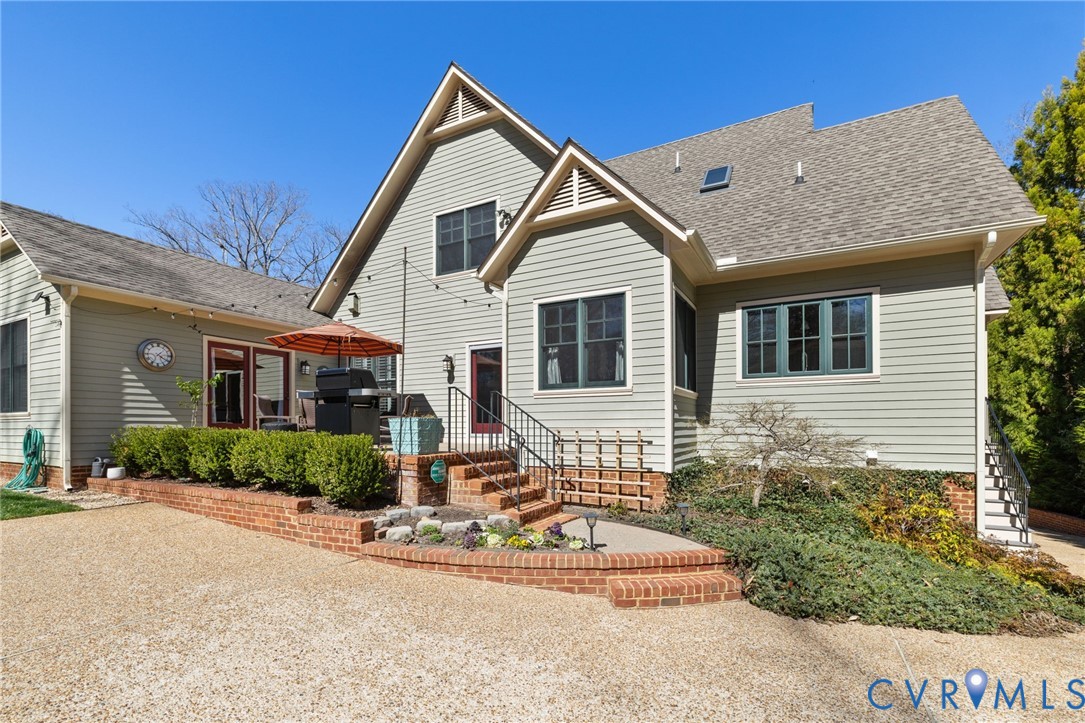 8947 Cherokee Road Richmond, VA 23235 - Photo 41 of 45 a front view of a house with a yard