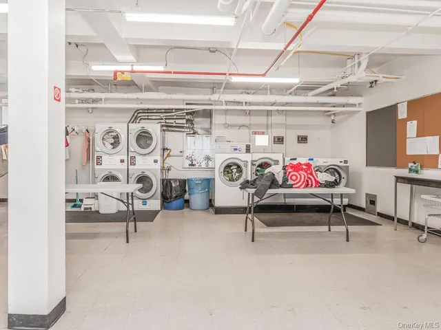 a view of livingroom with furniture and a chandelier