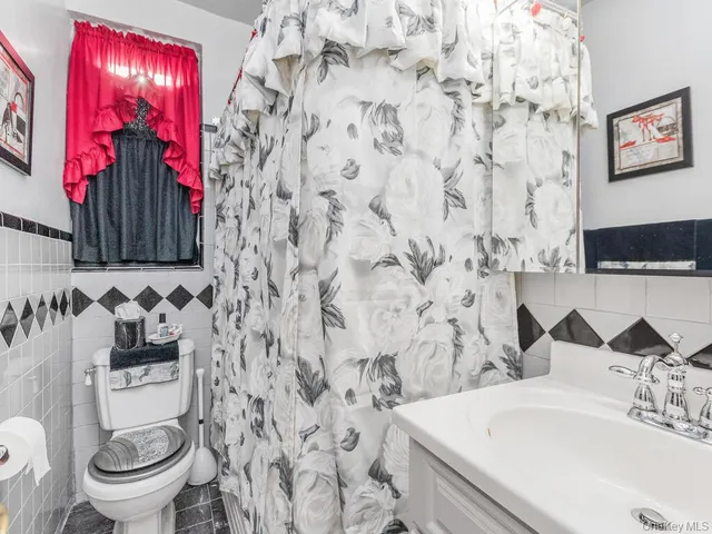 a bathroom with a sink and a toilet