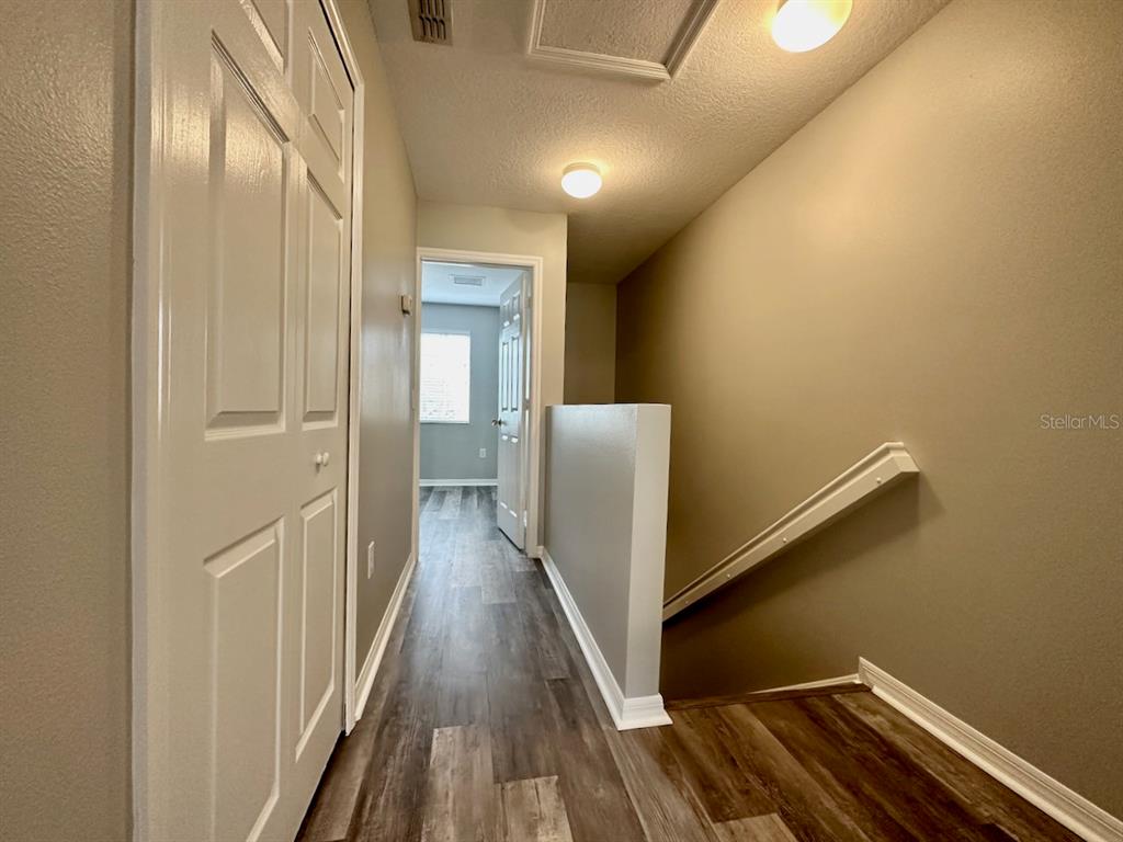 8532 Brushleaf Way Tampa, FL 33647 - Photo 18 of 20 a view of hallway with wooden floor
