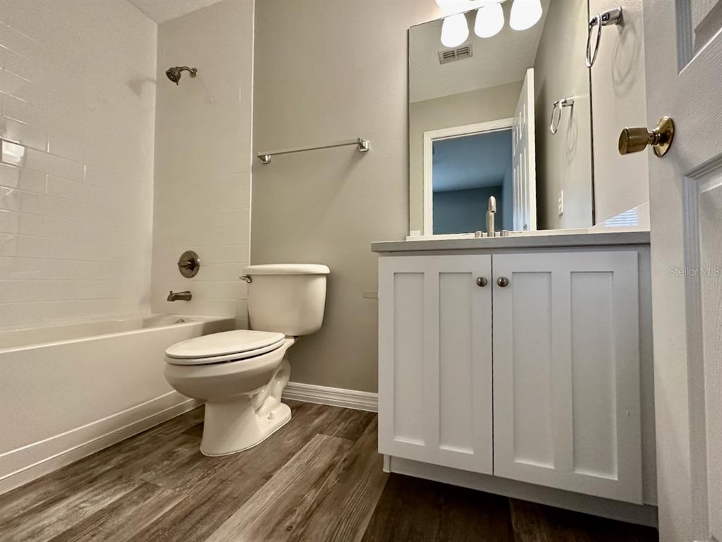 8532 Brushleaf Way Tampa, FL 33647 - Photo 20 of 20 a bathroom with a toilet and a sink