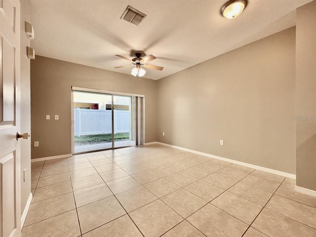 8532 Brushleaf Way Tampa, FL 33647 - Photo 5 of 20 a view of an empty room with a window