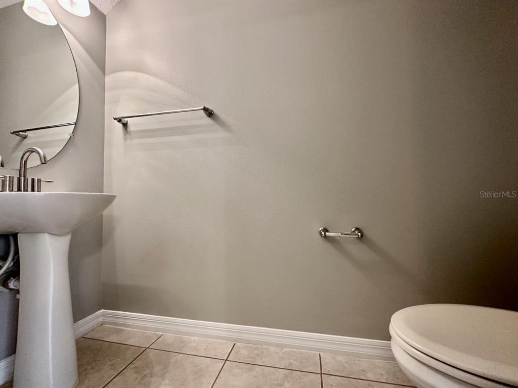8532 Brushleaf Way Tampa, FL 33647 - Photo 10 of 20 a bathroom with a sink a toilet and shower