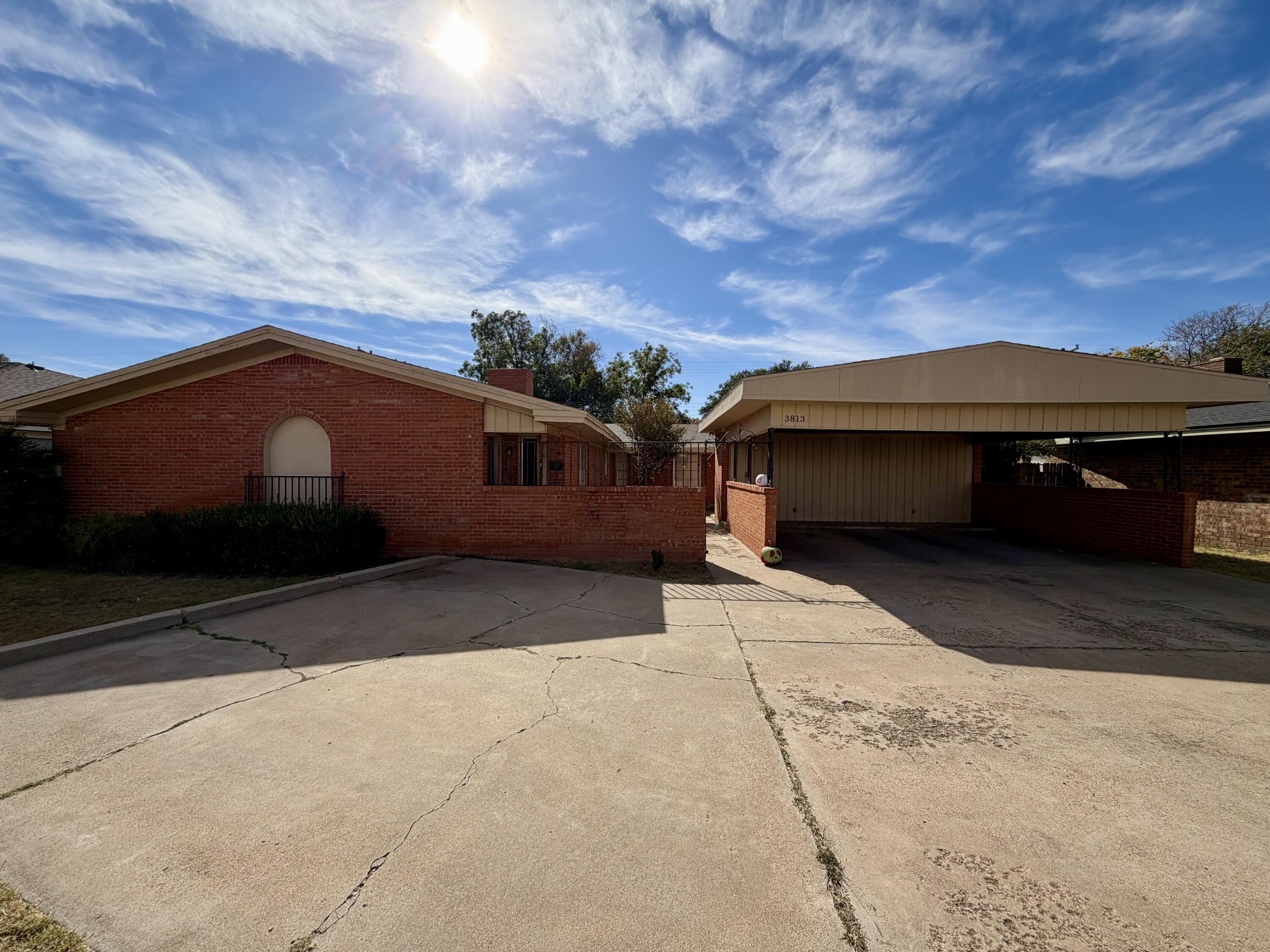 3813 51st Street, Unit A Lubbock, TX 79413 - Photo 1 of 17 a view of house with a outdoor space