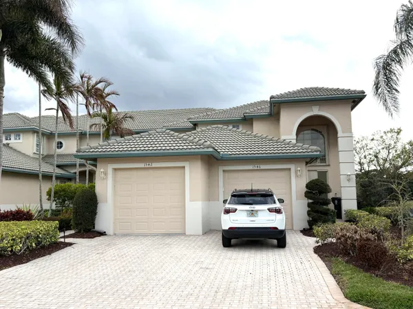 a car parked in front of a house