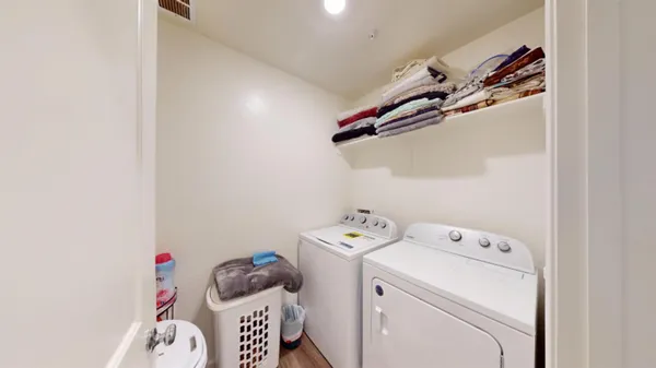 a kitchen with a sink and a mirror