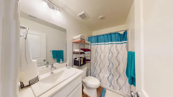 a view of a backyard with sitting area