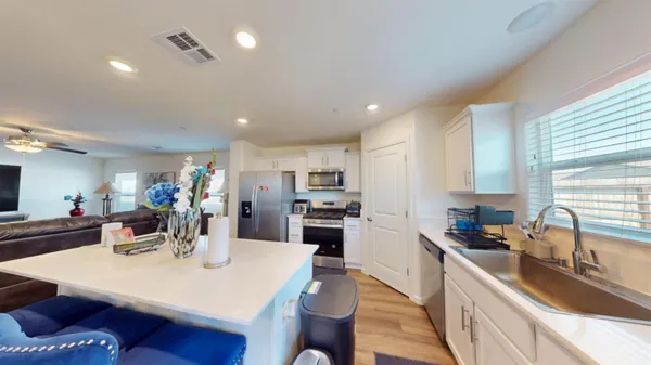 a view of a dining room with furniture