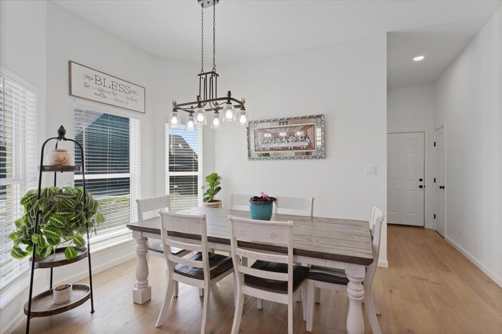 6514 Old Clarksville Road Reno, TX 75462 - Photo 17 of 27 a dining room with furniture and window