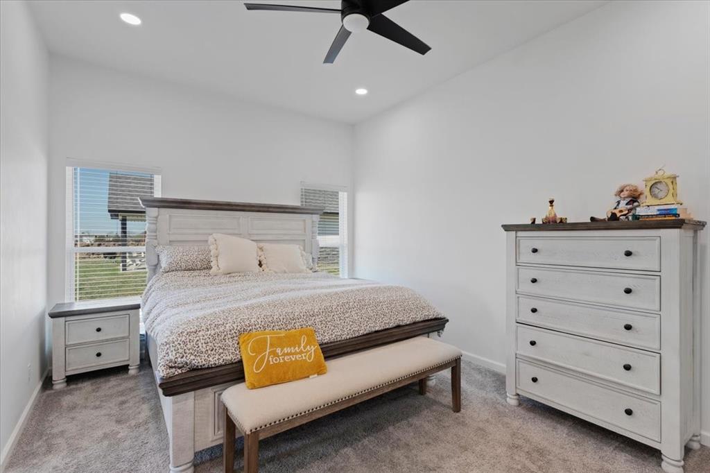 6514 Old Clarksville Road Reno, TX 75462 - Photo 20 of 27 a bedroom with a bed and a dresser