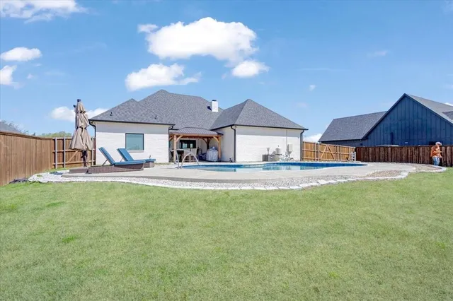 a house view with a garden space