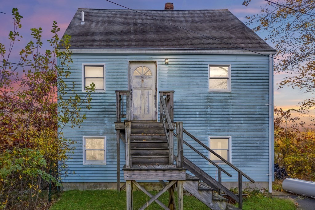 19 Ell Road Holbrook, MA 02343 - Photo 1 of 16 a view of house with wooden deck and a yard