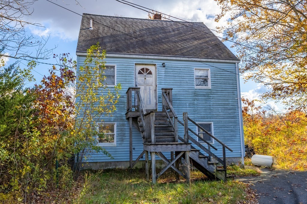 19 Ell Road Holbrook, MA 02343 - Photo 2 of 16 a view of a house with wooden fence