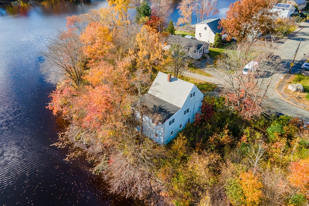19 Ell Road Holbrook, MA 02343 - Photo 6 of 16 a aerial view of a house with a yard and lake view