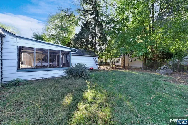 a house view with a garden space