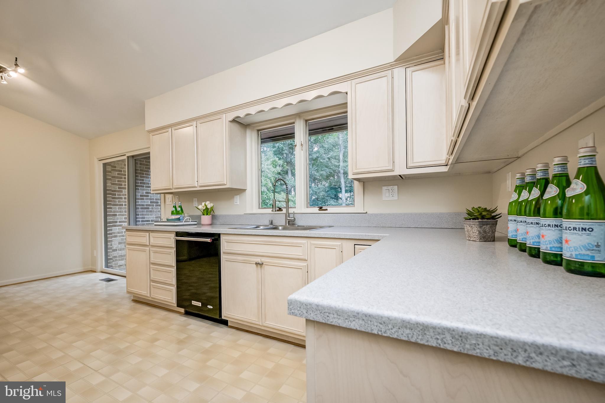 14048 Howard Road Dayton, MD 21036 - Photo 11 of 42 Kitchen with solid surface countertops