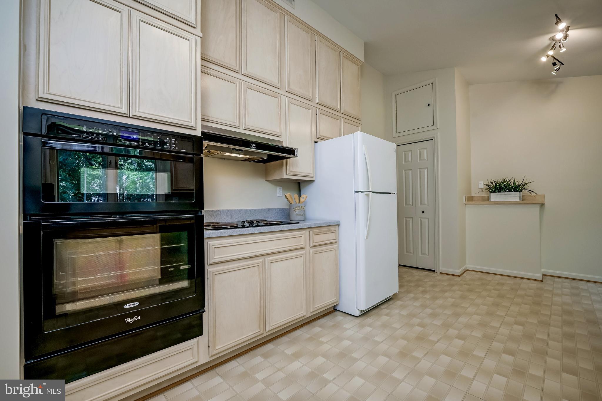 14048 Howard Road Dayton, MD 21036 - Photo 12 of 42 Kitchen with wall oven, microwave and cooktop