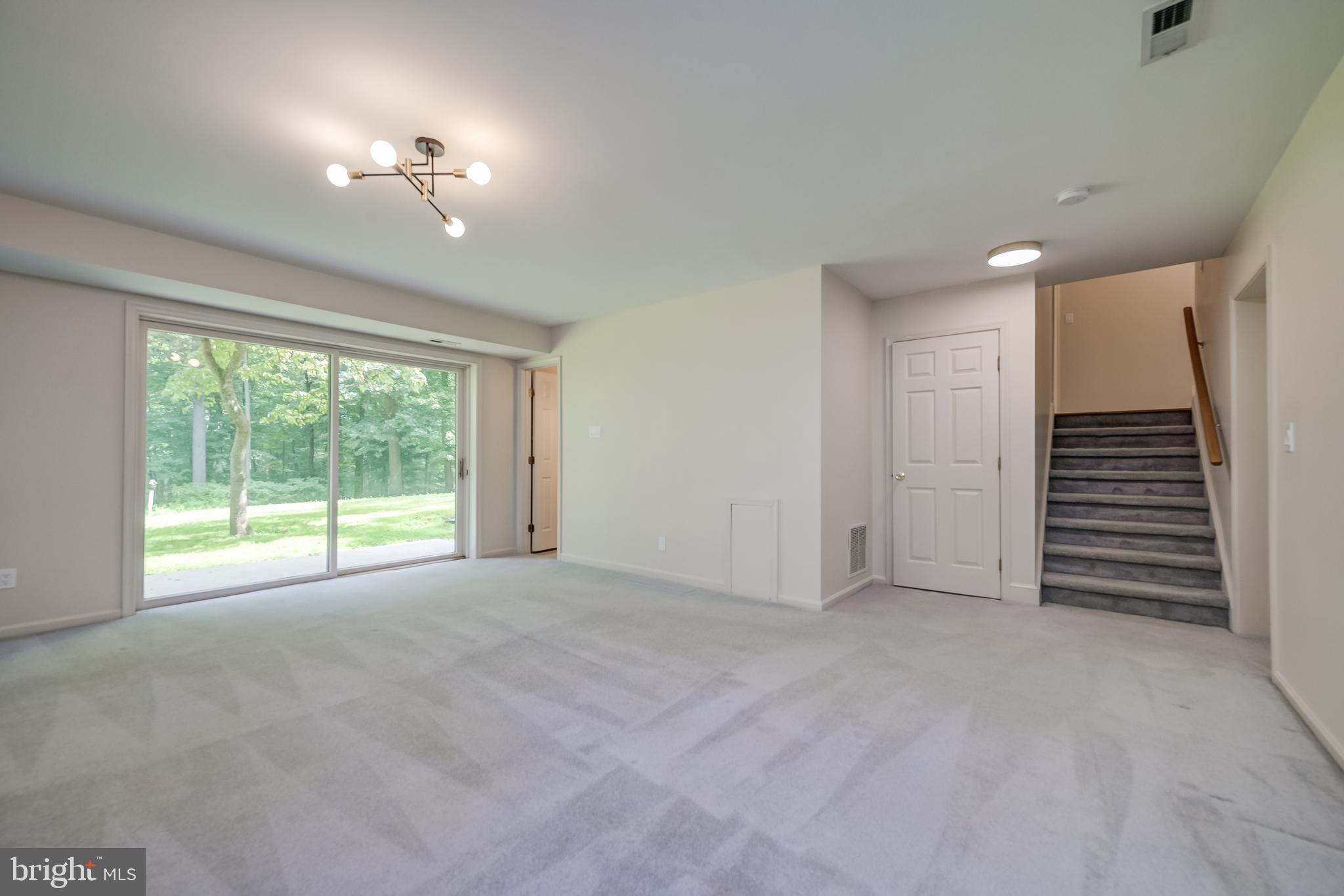 14048 Howard Road Dayton, MD 21036 - Photo 19 of 42 Family room with access to full bath