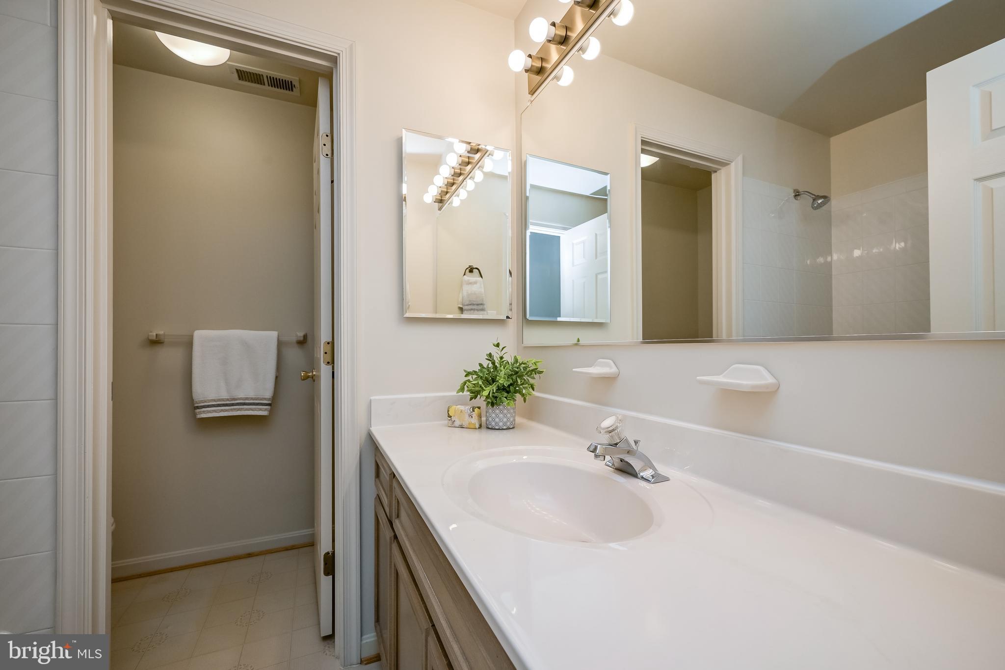 14048 Howard Road Dayton, MD 21036 - Photo 33 of 42 Hall bath with full length vanity & water closet
