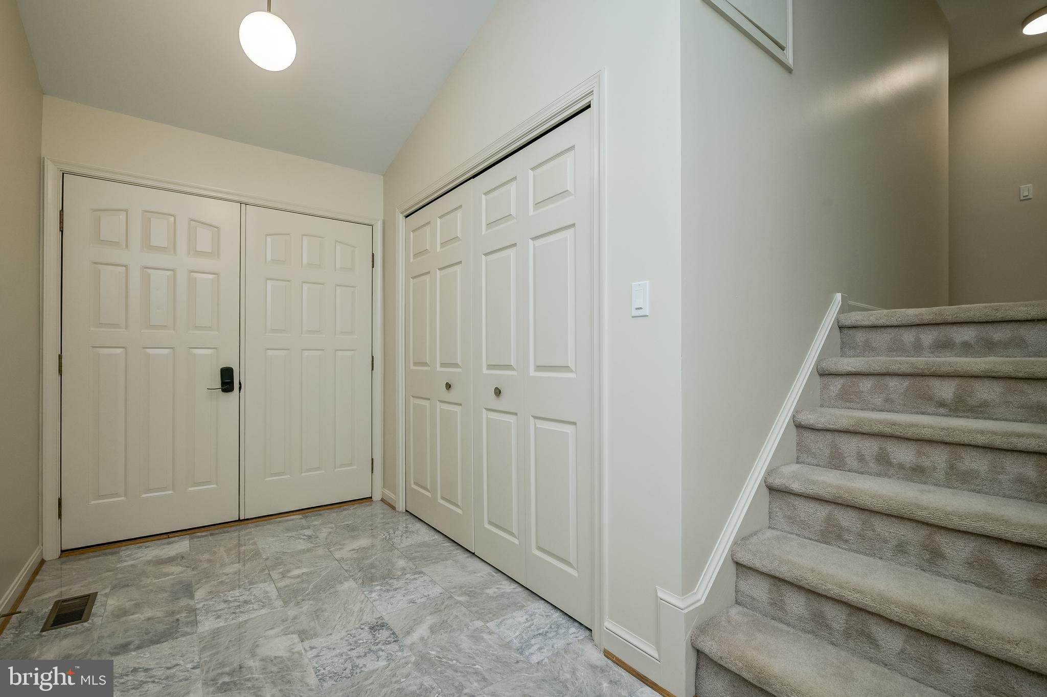 14048 Howard Road Dayton, MD 21036 - Photo 37 of 42 Foyer with vaulted ceilings and updated lighting