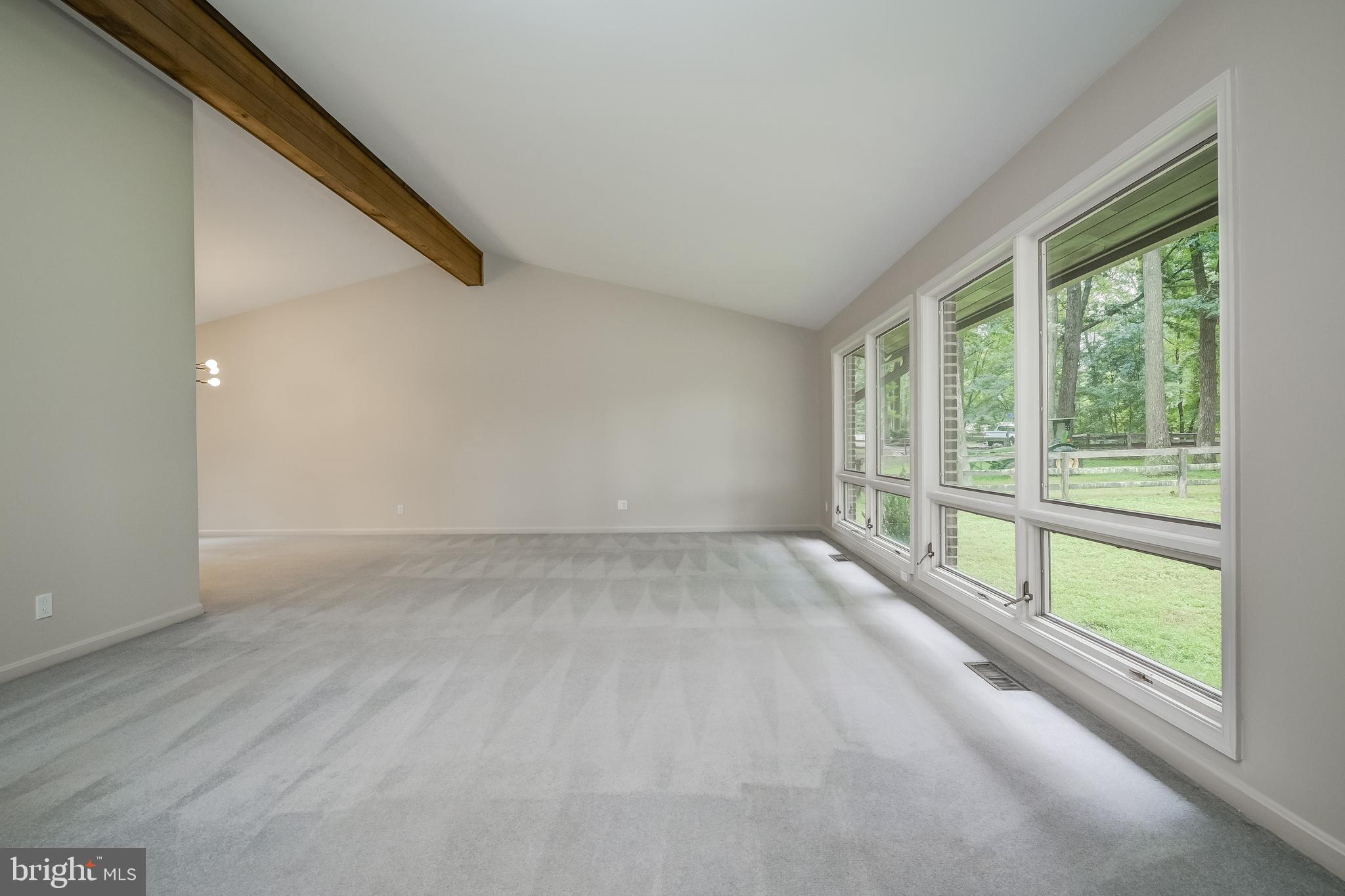 14048 Howard Road Dayton, MD 21036 - Photo 5 of 42 Large living room opens to dining