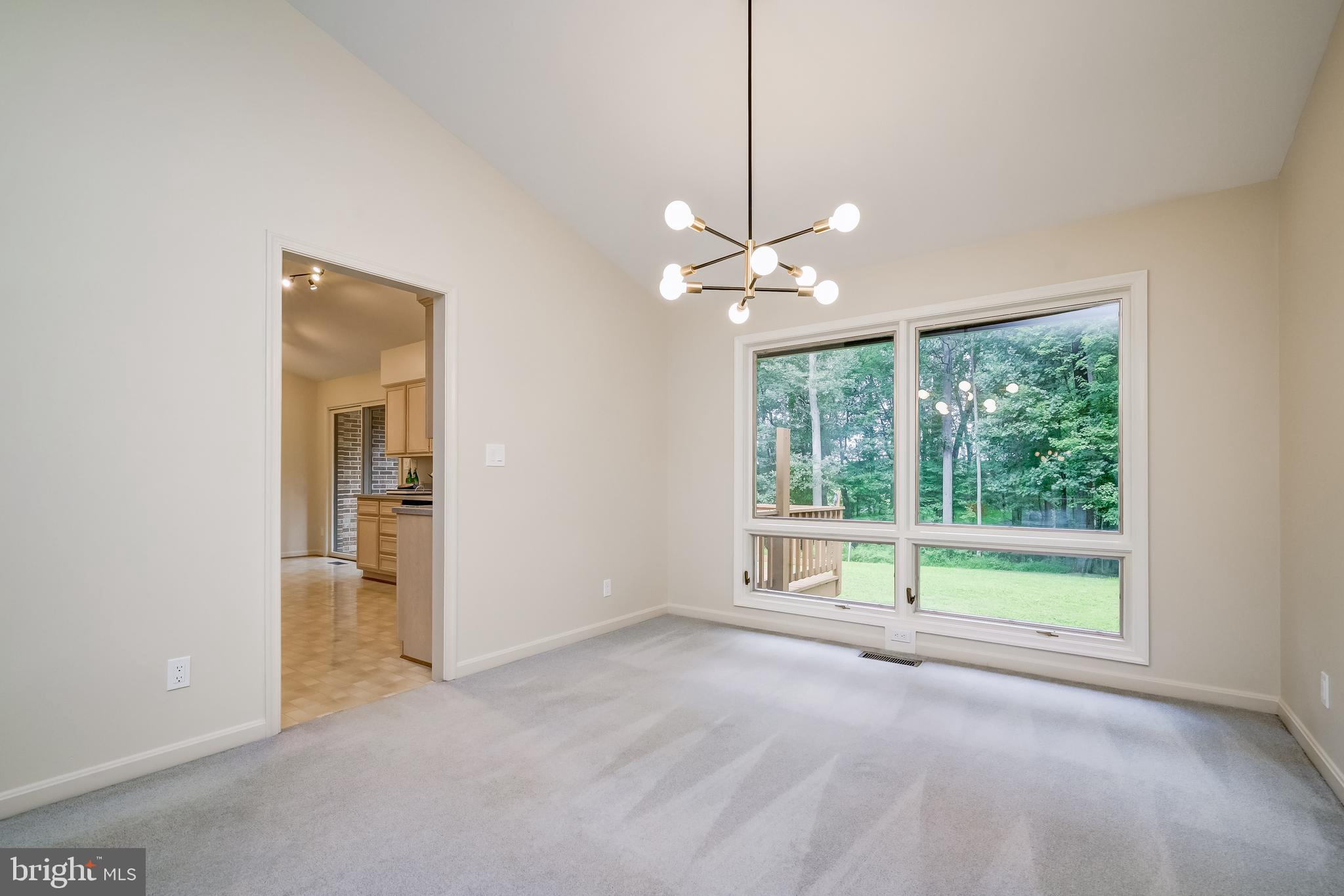 14048 Howard Road Dayton, MD 21036 - Photo 9 of 42 Dining room with oversized windows w/private views