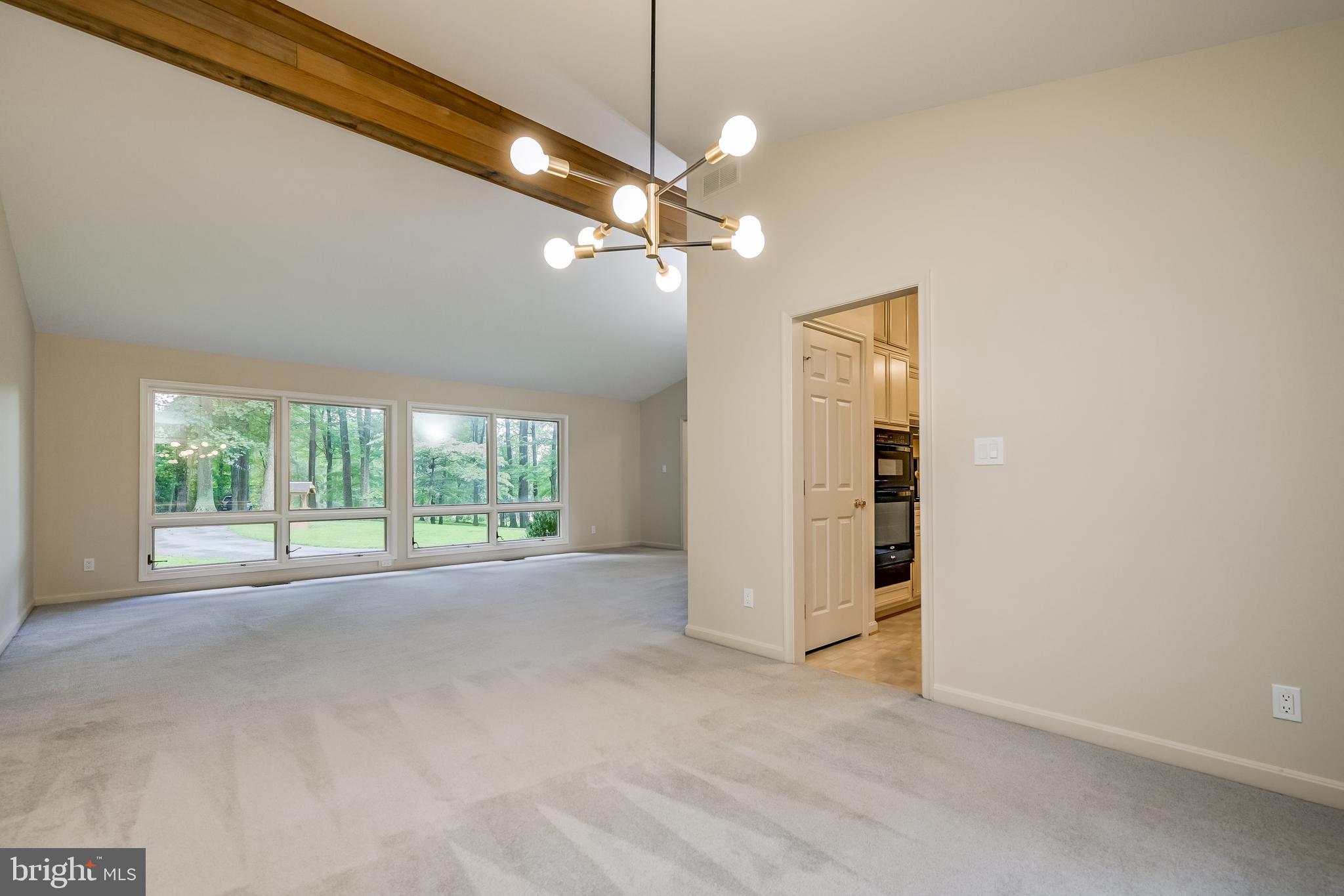 14048 Howard Road Dayton, MD 21036 - Photo 10 of 42 Dining room opens to living room