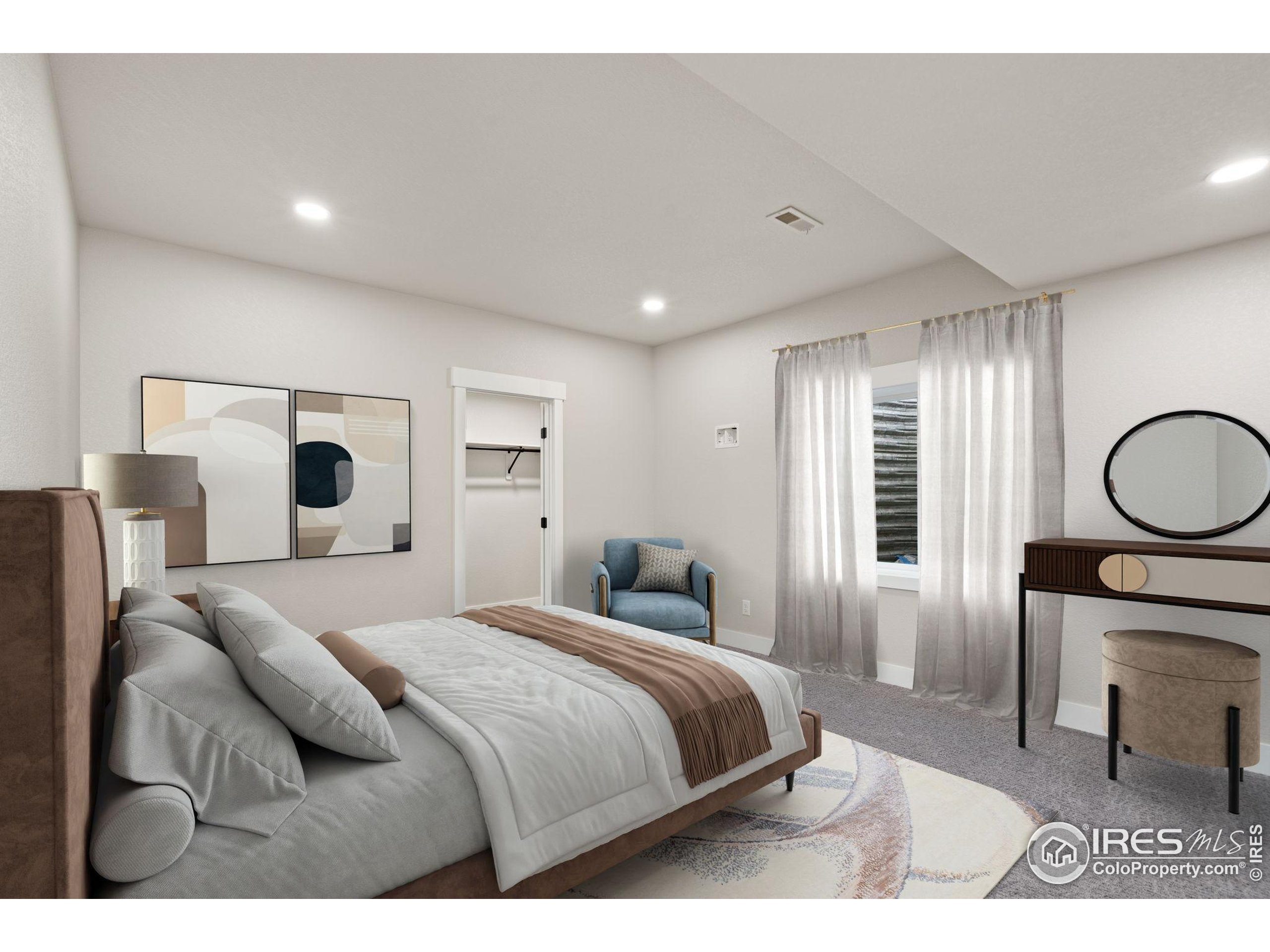 1369 Burt Avenue Berthoud, CO 80513 - Photo 32 of 41 a bedroom with a bed a mirror and a window