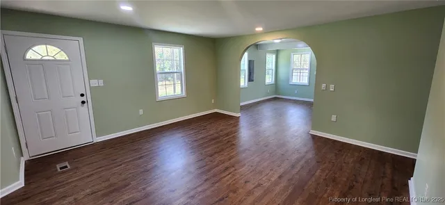 a view of kitchen with stainless steel appliances refrigerator oven and stove