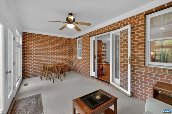 a view of livingroom with furniture and a window