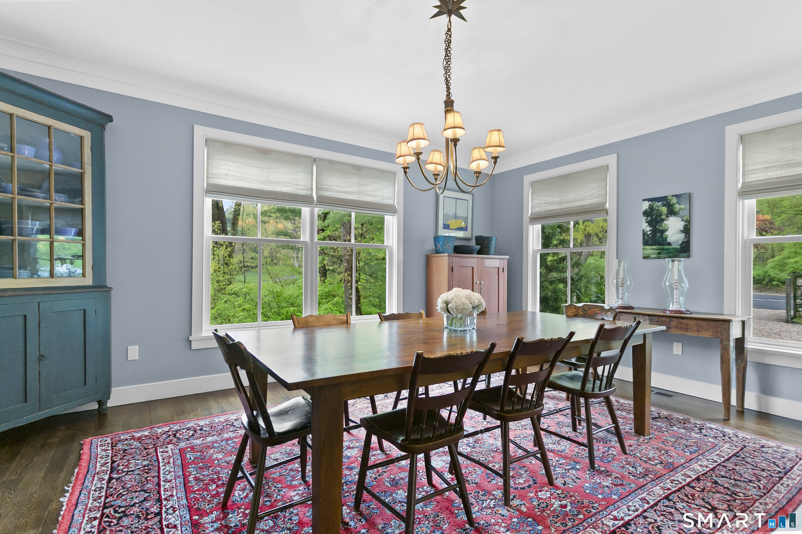 3007 Redding Road Fairfield, CT 06824 - Photo 14 of 40 a view of a dining room with furniture window and wooden floor