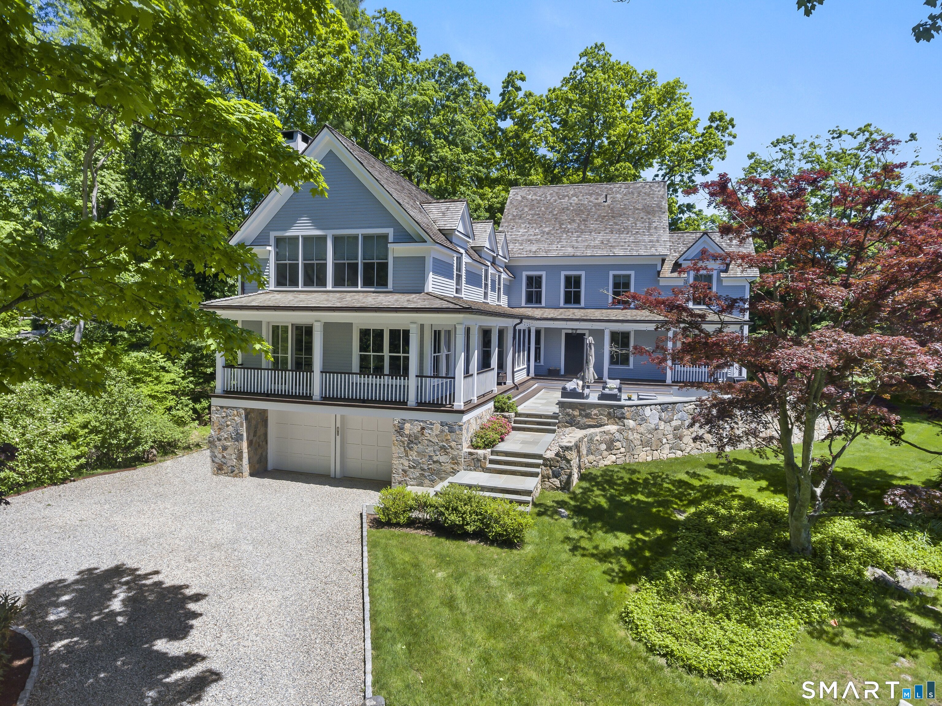 3007 Redding Road Fairfield, CT 06824 - Photo 2 of 40 a front view of house with a garden