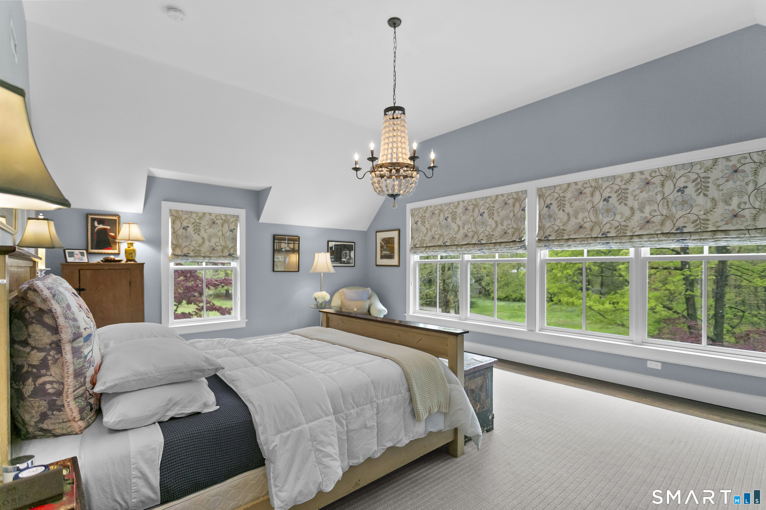 3007 Redding Road Fairfield, CT 06824 - Photo 21 of 40 a bedroom with a large bed and a large window