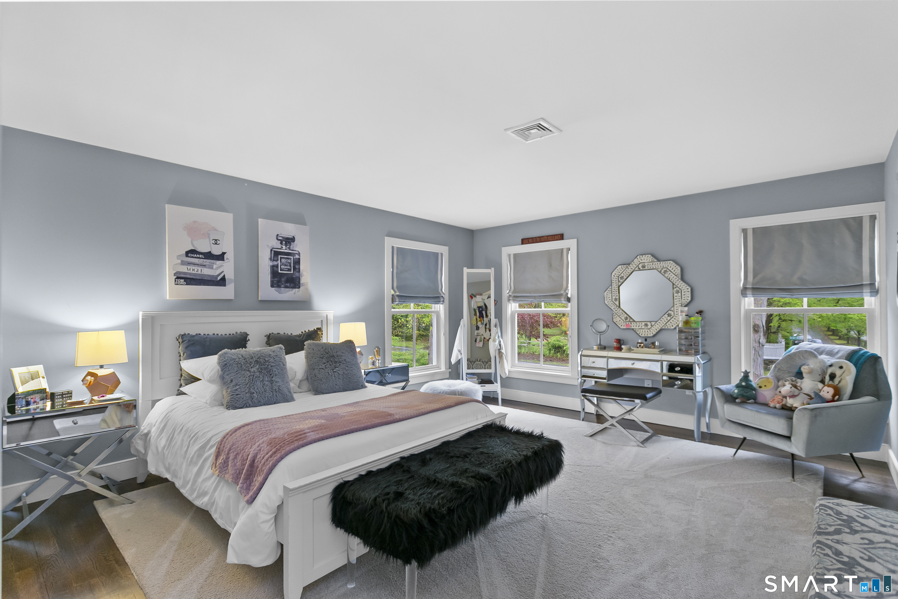 3007 Redding Road Fairfield, CT 06824 - Photo 26 of 40 a bedroom with a bed a large window and a couch