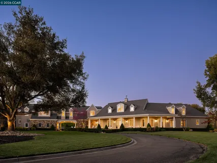 a view of a big building with a big yard