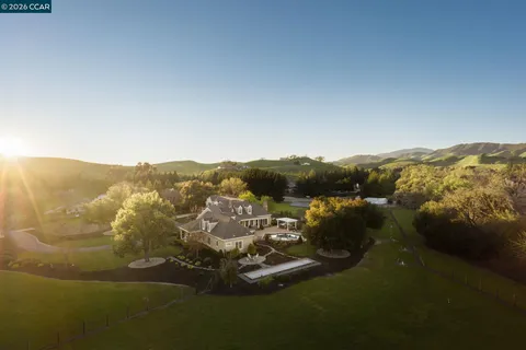a view of a house with a mountain