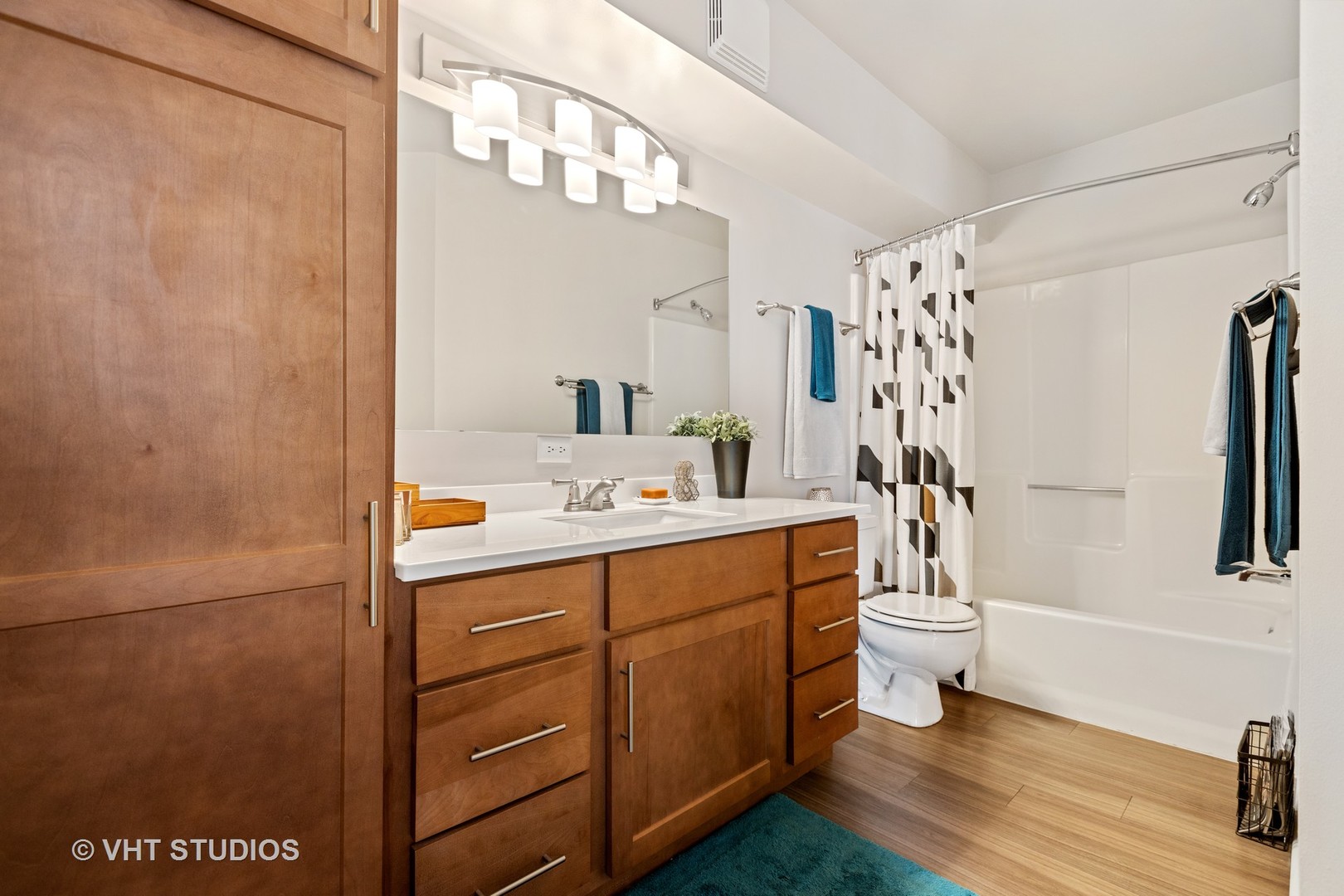 1919 Brookdale Road, Unit 108 Naperville, IL 60563 - Photo 45 of 53 a bathroom with a sink a toilet and shower