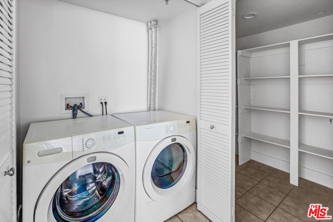 7249 Franklin Avenue, Unit 204 Los Angeles, CA 90046 - Photo 11 of 17 a utility room with dryer and washer
