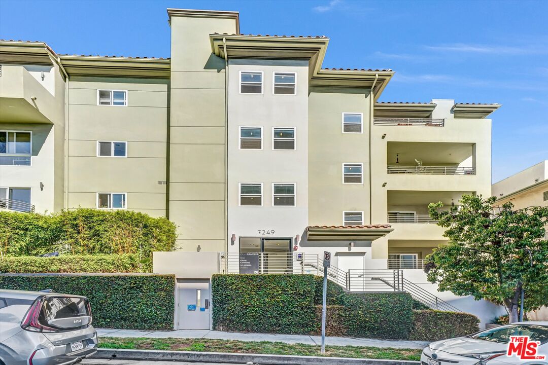 7249 Franklin Avenue, Unit 204 Los Angeles, CA 90046 - Photo 15 of 17 a front view of a building with garden