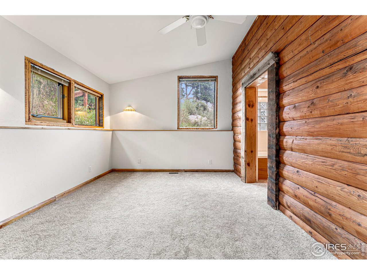 3907 Ridge Road Nederland, CO 80466 - Photo 14 of 40 Main floor bedroom or flex space.