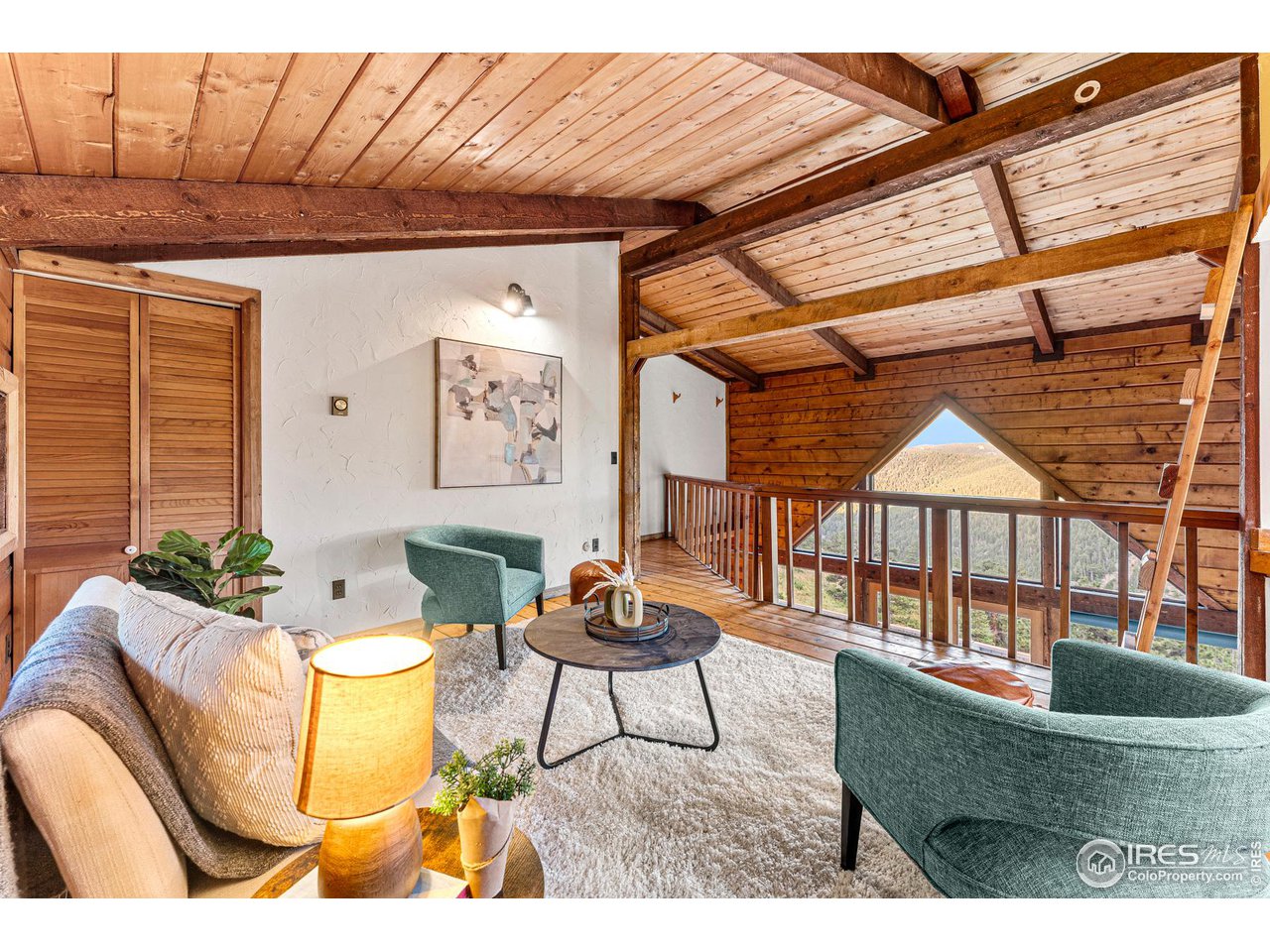 3907 Ridge Road Nederland, CO 80466 - Photo 18 of 40 Loft perfect for primary sitting room, at home office, yoga, flex space