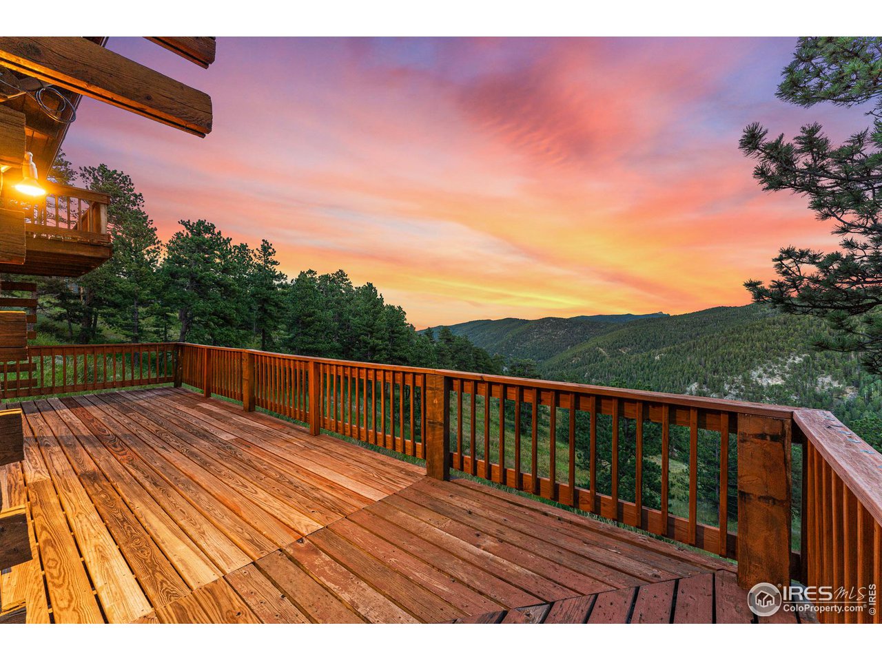 3907 Ridge Road Nederland, CO 80466 - Photo 9 of 40 Wrap around deck with amazing views. Perfect for entertaining!