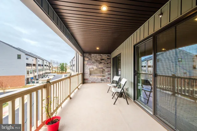 a view of a porch with furniture