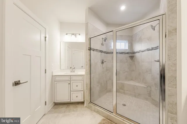 a white toilet sitting next to a window