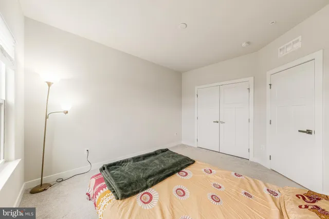 a view of a hallway with a white walls