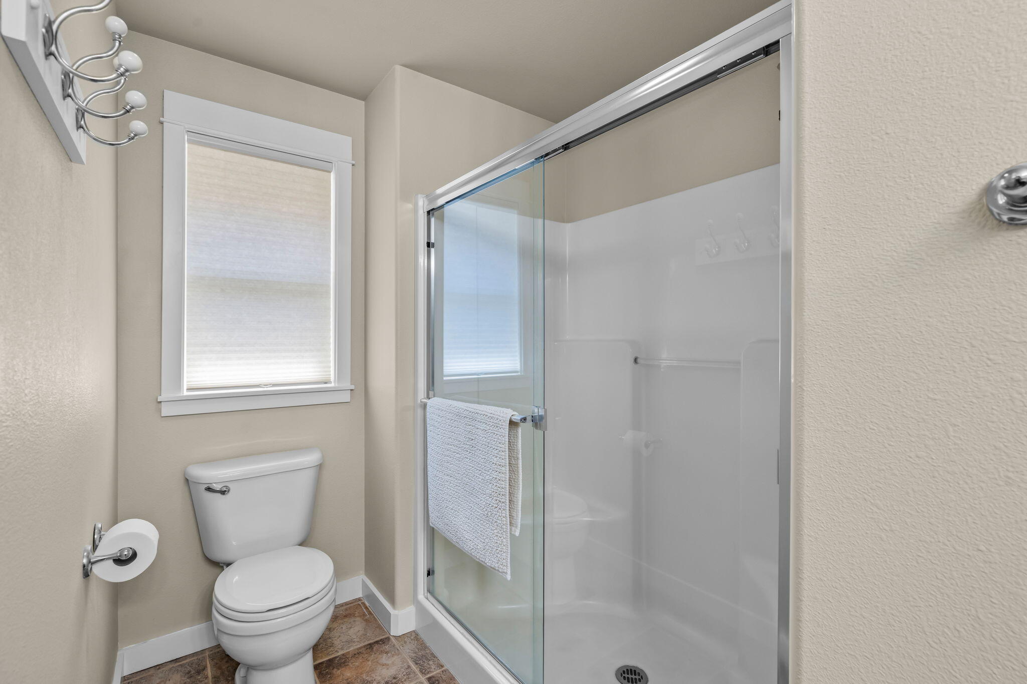 3714 Southwest 29th Street Redmond, OR 97756 - Photo 14 of 21 a bathroom with a toilet and a shower